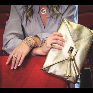 Looking for this! Lilly Pulitzer Gold Clutch